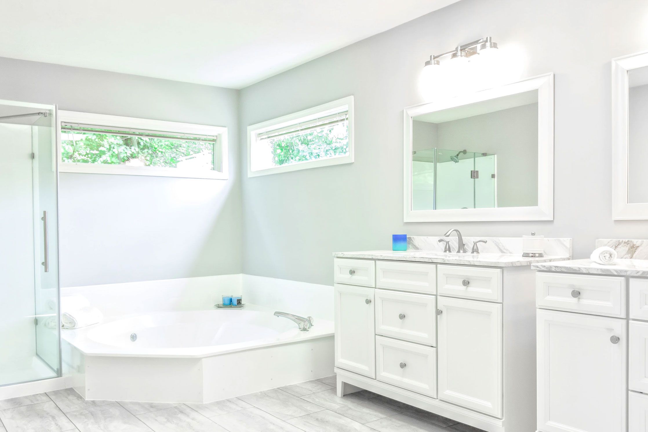 Modern contemporary kitchen featuring sleek cabinetry, quartz countertops, and stainless steel fixtures installed by Royal T Plumbing in Vancouver.